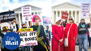 Pro-life and pro-choice protesters gather outside Supreme Court during Texas anti-abortion appeals