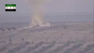 FSA destroy regime T-72 tank  with TOW missile on Al-Husseiniyat front, rural east Hama