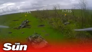 Ukrainian Kamikaze drone crashes into Russian tanks in huge blast