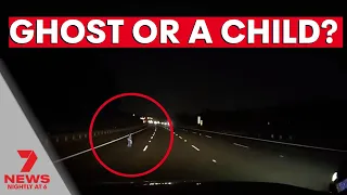 CHILD OR GHOST? | Driver's dashcam captures eerie footage of ‘child’ wandering on a highway | 7NEWS