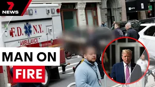 Horrifying scenes as protester sets himself on fire outside Trump trial | 7 News Australia