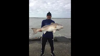 My biggest bull red fish on Surfside Jetty, Texas