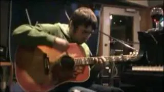 Oasis - Liam Gallagher playing guitar in studio