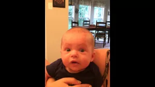 Baby Atticus eating his cereal for the first time.