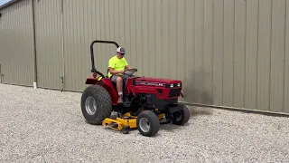 Case IH 245 tractor w belly mower