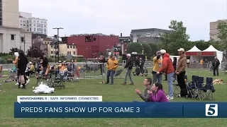Fans cheer on the Predators during the Stanley Cup Playoffs