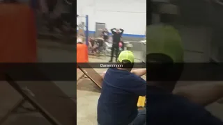 Wrestler slams concrete through table