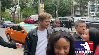 Joe Alwyn arrives at the Hollywood Reporter lounge in Toronto and poses with fans during TIFF.