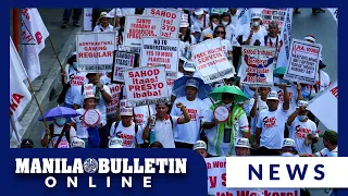 Health workers protest in Manila, call for living wage