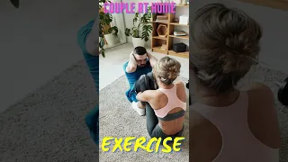 Couple Doing Exercise At Home