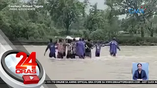 Ilang residente, nagbayanihan para maitawid sa rumaragasang ilog ang labi ng kanilang... | 24 Oras