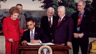 President Obama, with Nancy Reagan, Signs Law for Ronald Reagan