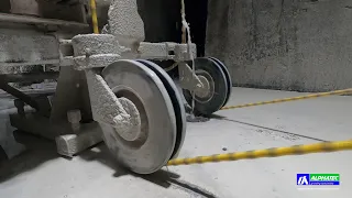 Cutting a concrete foundation with a Husqvarna CS 10 wire saw