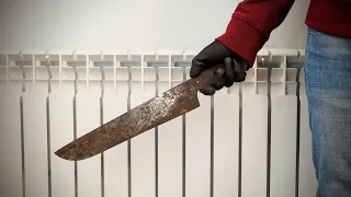 Restoration and restoration of a huge kitchen knife.