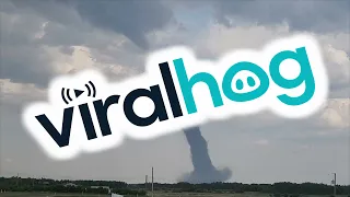Tornado Swirls Outside Stettler Canada || ViralHog
