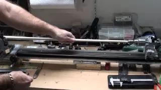 Cleaning a predator shaft using a cue lathe