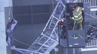 FULL VIDEO: Fire crew rescues workers stranded on collapsed scaffolding