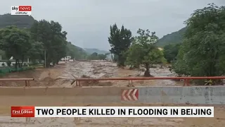 Two people dead in severe flooding in Beijing