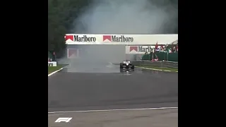 Kimi Raikkonen goes full throttle through cloud of smoke... | F1 Belgium 2002