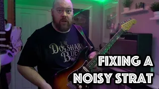 HOW TO FIX A NOISY FENDER STRATOCASTER - SHIELDING A GUITAR WITH COPPER TAPE