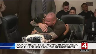 Woman reunites with officer, paramedic who pulled her from Detroit River