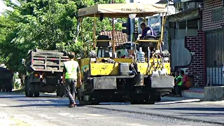 Asphalt paving road construction work with paver tandem roller and truck - SUMITOMO - BOMAG VR 66