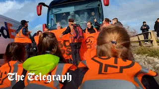 Driver ploughs through Just Stop Oil protesters blocking migrant coach heading to Bibby Stockholm