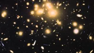 Massive Galaxy Cluster Warps Space, Reveals Whats Behind It | Video