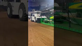 Big Bud Tractor making the pulling sled look small in Louisville, Kentucky.  Tractor Pulling