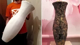 Floor vase with their hands out of cardboard and putty