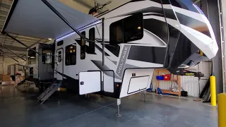 2021 Voltage 4205 Toy Hauler 5TH Wheel by Dutchmen RV @ Couchs RV Nation RV Walkthrough Tour Review