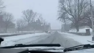 Car stuck in snow Brady St. hill 12-28-2021