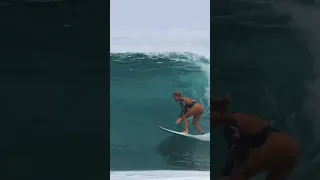 Surfer girl gets barreled in Hawaii