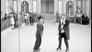 Charlie Chaplin fight for a girl, from the movie " The Rink"