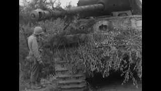 American GI's checking a burned Panther Ausf. G. France, 1944.