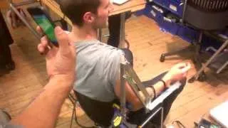 Testing Assistive Arm Exoskeleton with NMES