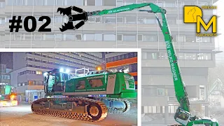 Mean green giant excavator Liebherr R960 high reach excavator crushing office building