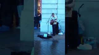 Tom Kirotar busking at Piccadilly Circus