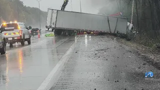 Residents navigate around rainy conditions