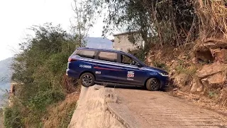 The driving expert demonstrates the very narrow road U-turn skills