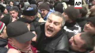 Crimean Tatars and Pro-Russian activists clased outside a local parliament building in Ukraine's Cri