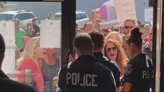 Anti-mask protesters lead to cancellation of Coeur d'Alene school board meeting, district office loc