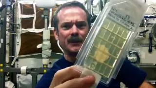 Hadfield demonstrates Microbial Air Sampling on the ISS