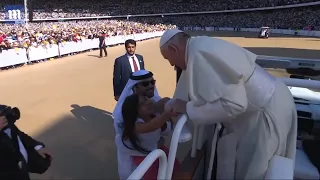 Girl breaks security barriers to run to the Pope in UAE