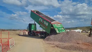 HGV Tipper unloading aggregate stone