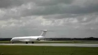 Flight line MD-80 jet taking off from Manchester 23L