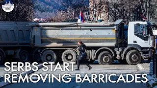 As tensions ease, Serbs begin to remove some roadblocks set up in Kosovo