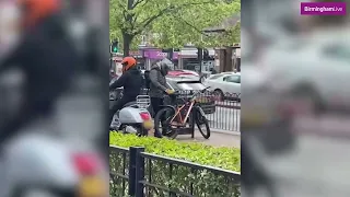 Moment brave bystander chases armed thieves stealing bike in broad daylight