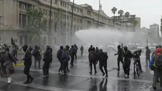 Police in Chile fire tear gas, use water cannons to disperse protesters | AFP