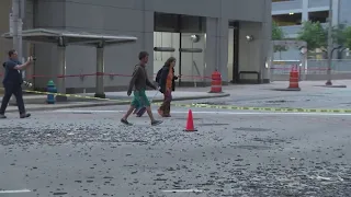 Part of downtown closed in downtown Houston as crews work to clean broken glass